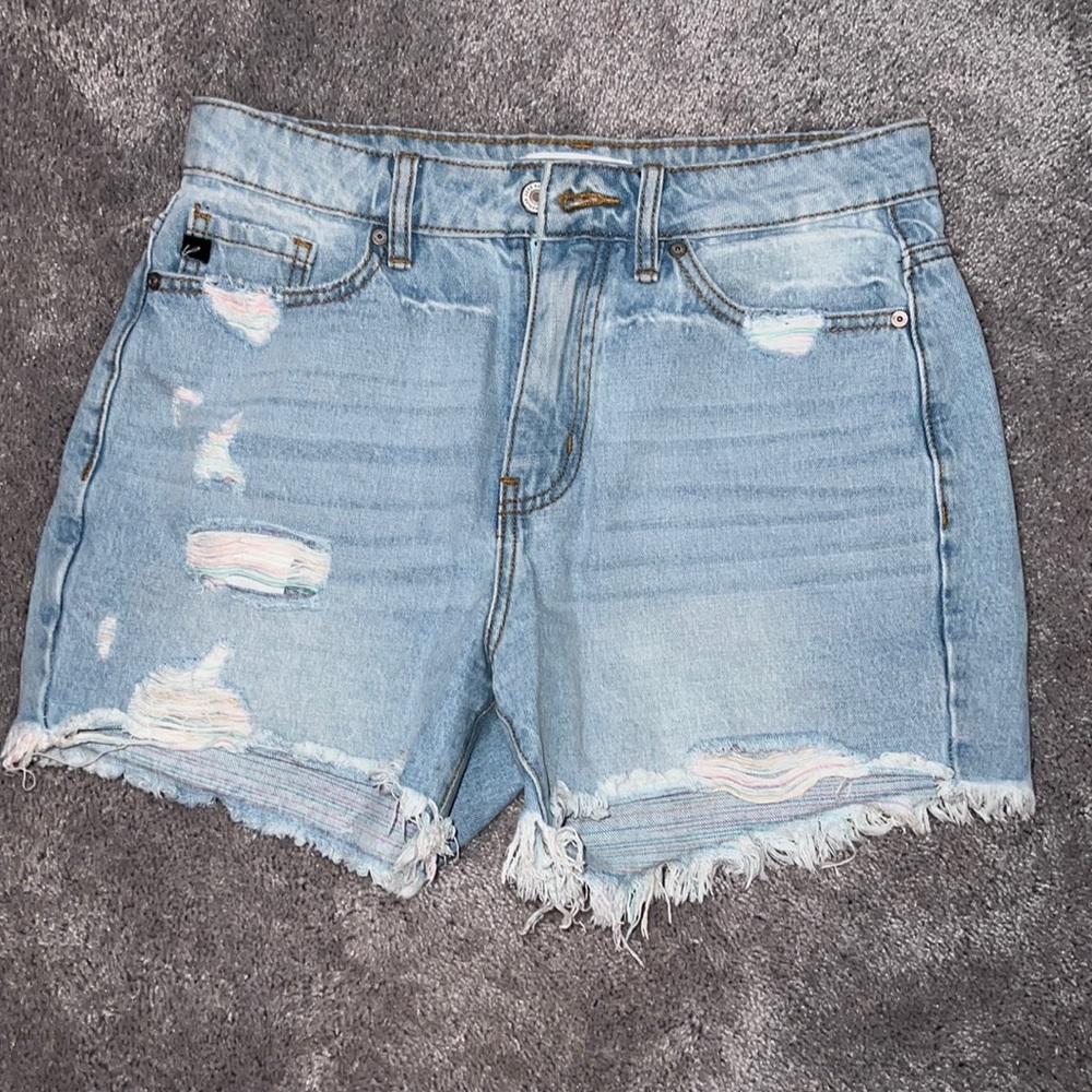 Women’s Kancan rainbow thread jean shorts.